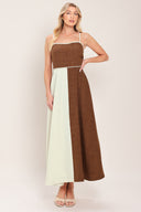 Woman wearing a two-tone dress with brown and white colors | Flying Tomato
