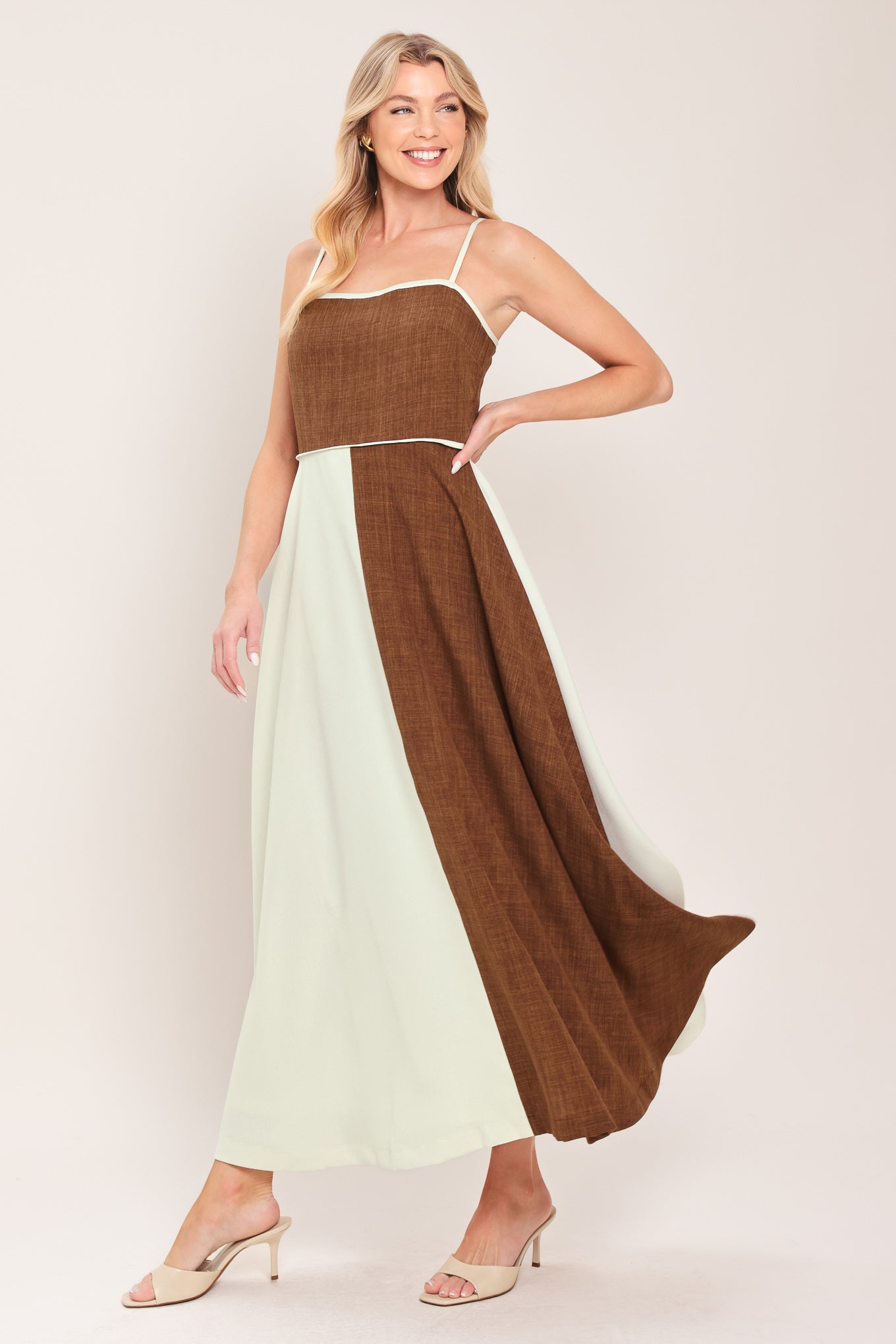 Woman wearing a two-tone dress with brown and white colors | Flying Tomato