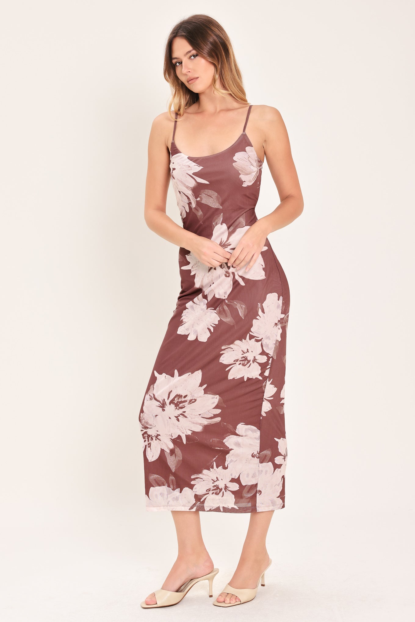 Woman wearing a dark mauve (red-bean tone) floral power mesh midi dress  | Flying Tomato