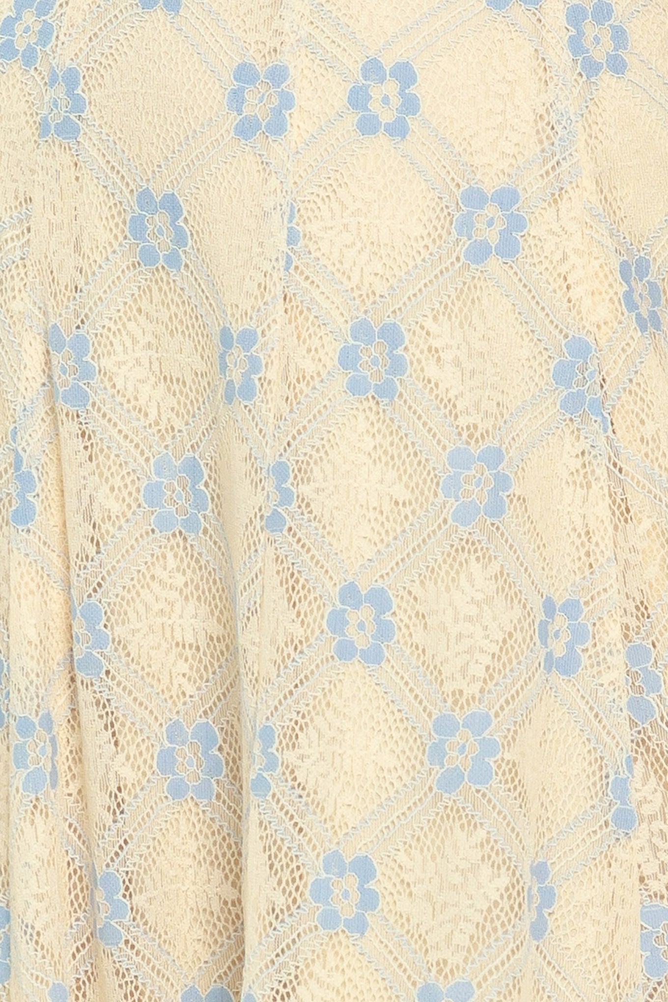 Close up of a yellow with blue floral lace midi dress | Flying Tomato