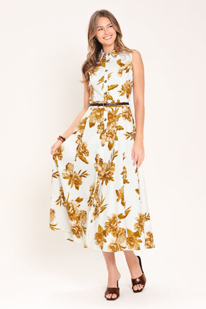 Woman wearing a sleeveless ivory midi dress with brown floral print featuring collar, front button down, contrasting belt and circle skirt | Flying Tomato