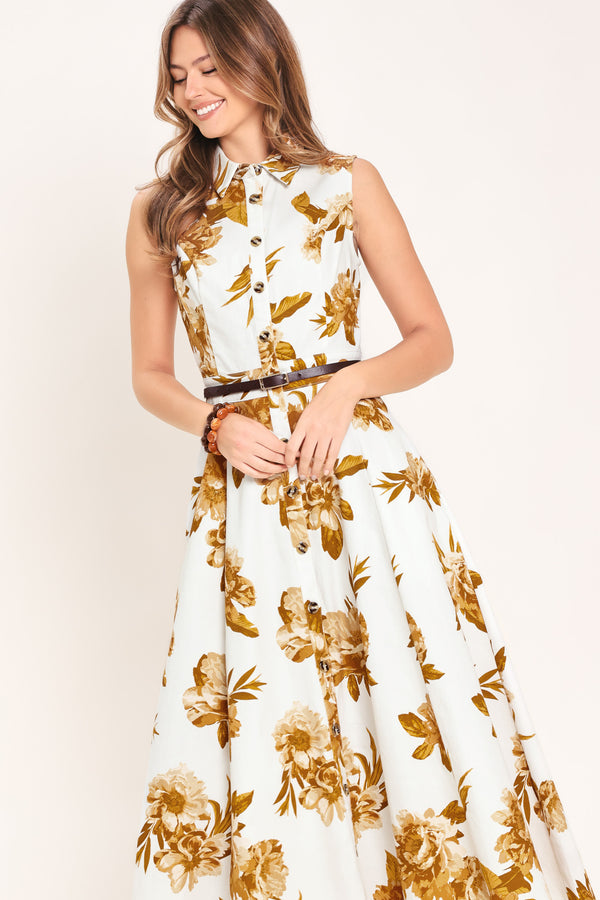Woman wearing a sleeveless ivory midi dress with brown floral print featuring collar, front button down, contrasting belt and circle skirt | Flying Tomato