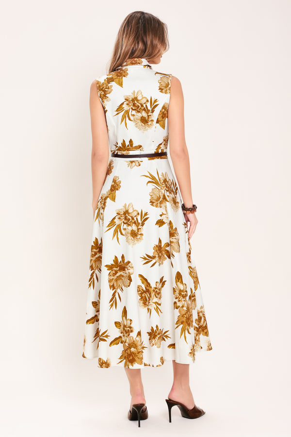 Woman wearing a sleeveless ivory midi dress with brown floral print featuring collar, front button down, contrasting belt and circle skirt | Flying Tomato