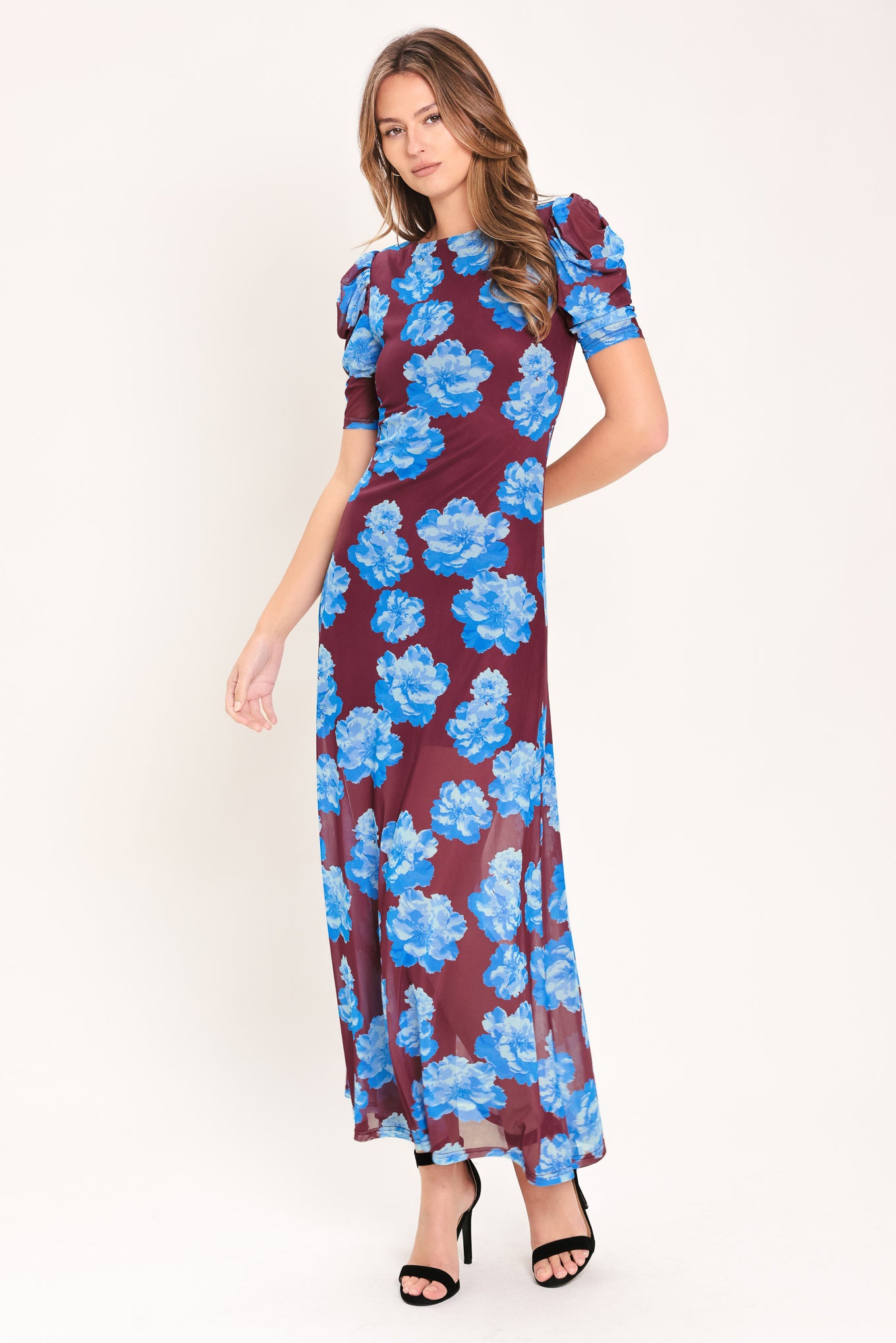 Woman wearing a wine power mesh midi dress with blue flowers | Flying Tomato