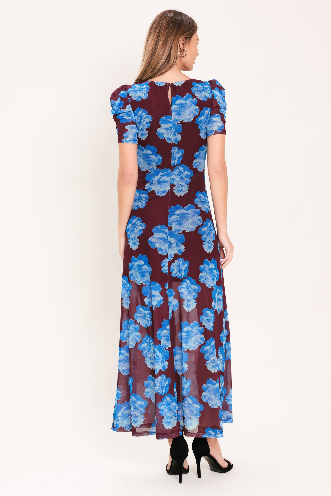 Woman wearing a wine power mesh midi dress with blue flowers | Flying Tomato