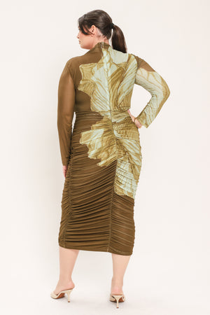 A woman models a long-sleeve midi dress with a brown base and a large beige floral print | Flying Tomato Curve