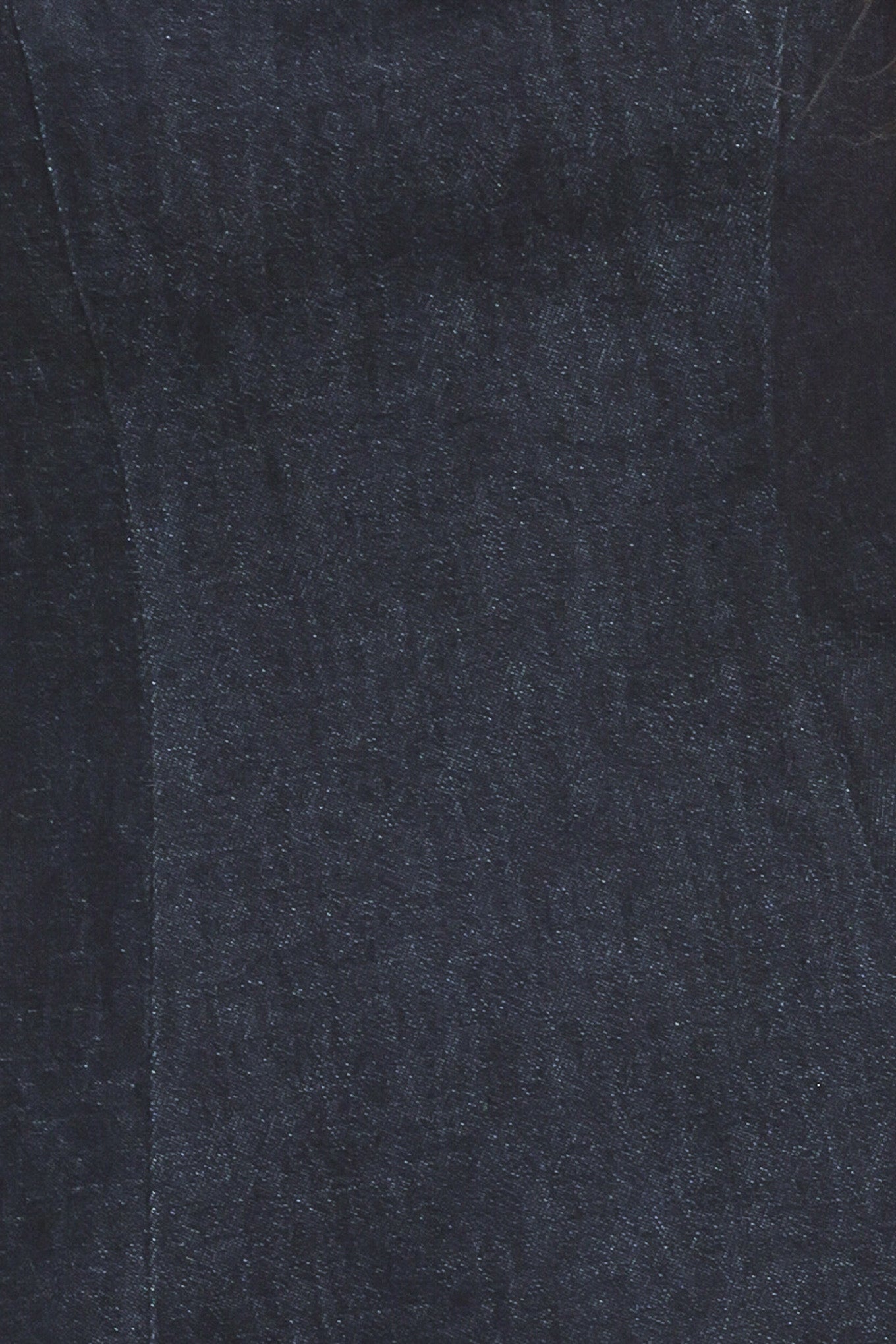 Woman wearing a dark blue denim mini dress featuring straight neckline straps, drop waist with double ruffle layers hem and back zipper closure | Flying Tomato