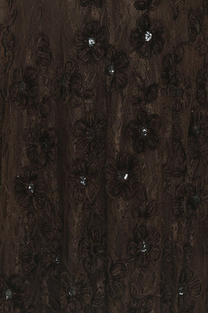 A woman modeling a brown lace midi dress with thin spaghetti straps, a fitted bodice, and a flared skirt | Flying Tomato