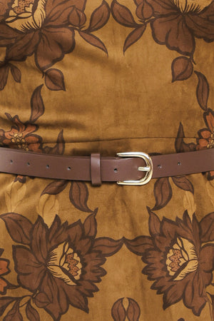 A woman modeling a sleeveless fit-and-flare mini dress with a brown and olive green floral damask pattern and a matching brown belt | Flying Tomato