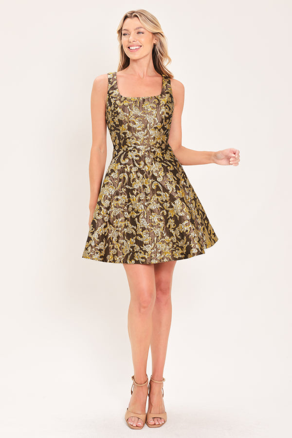 A woman modeling a sleeveless fit-and-flare dress with a brown, gold, and beige floral jacquard pattern | Flying Tomato
