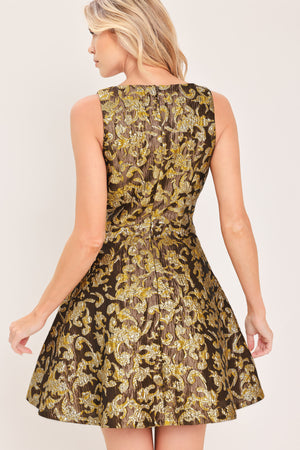 A woman modeling a sleeveless fit-and-flare dress with a brown, gold, and beige floral jacquard pattern | Flying Tomato