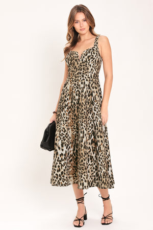 Woman wearing a sleeveless leopard print midi dress featuring sweetheart neckline, circle skirt and back zipper closure | Flying Tomato