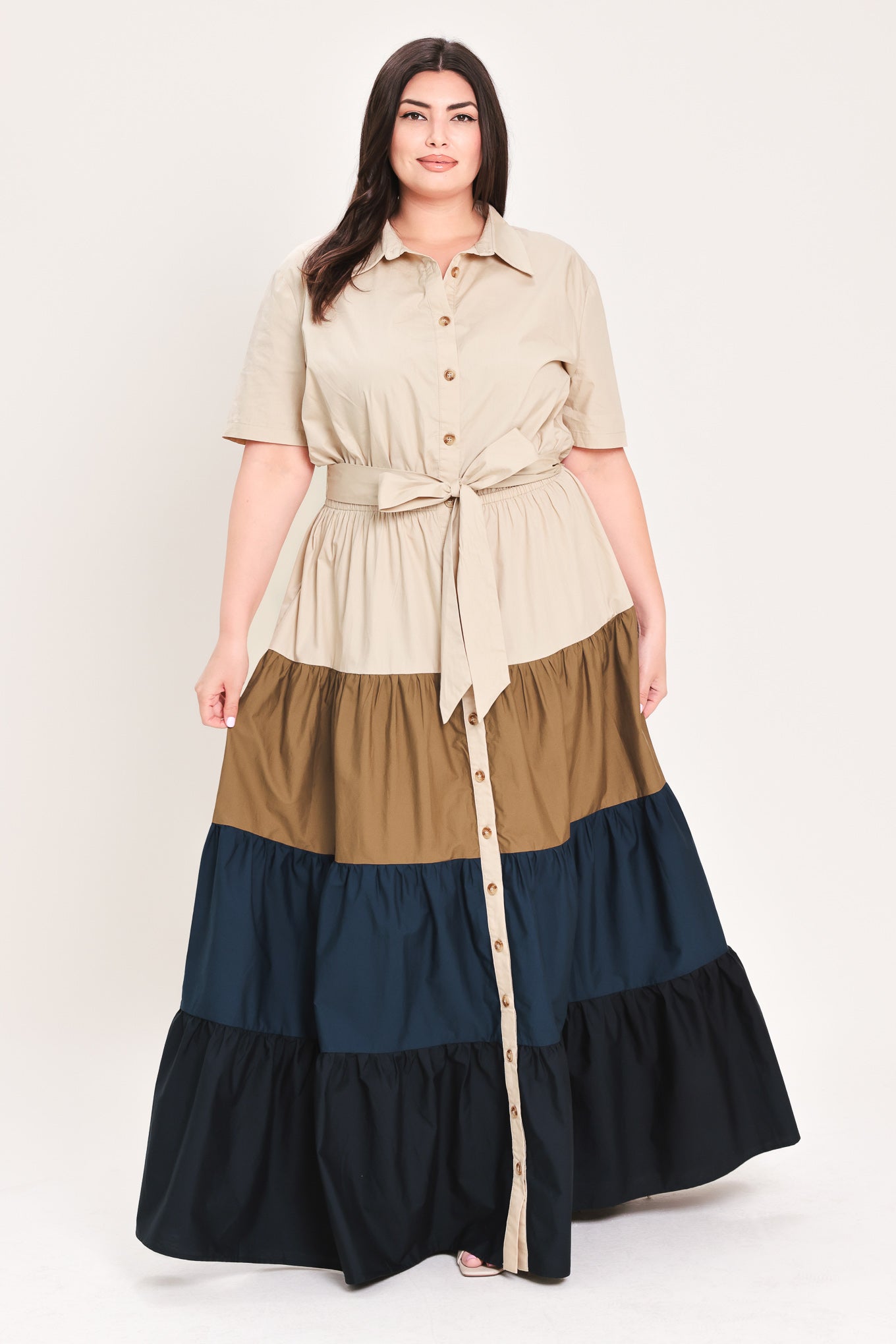 Woman wearing a color-blocked midi dress with beige, brown, and navy | Flying Tomato Curve