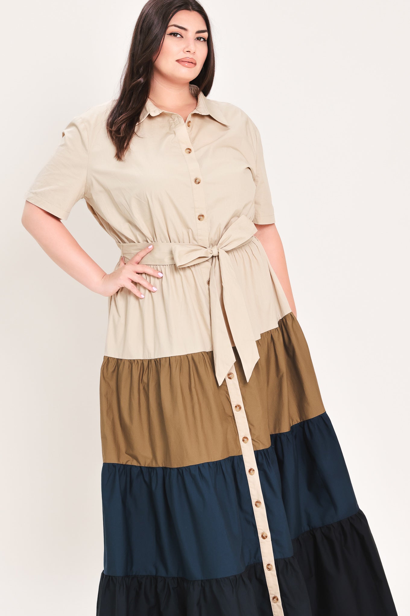 Woman wearing a color-blocked midi dress with beige, brown, and navy | Flying Tomato Curve