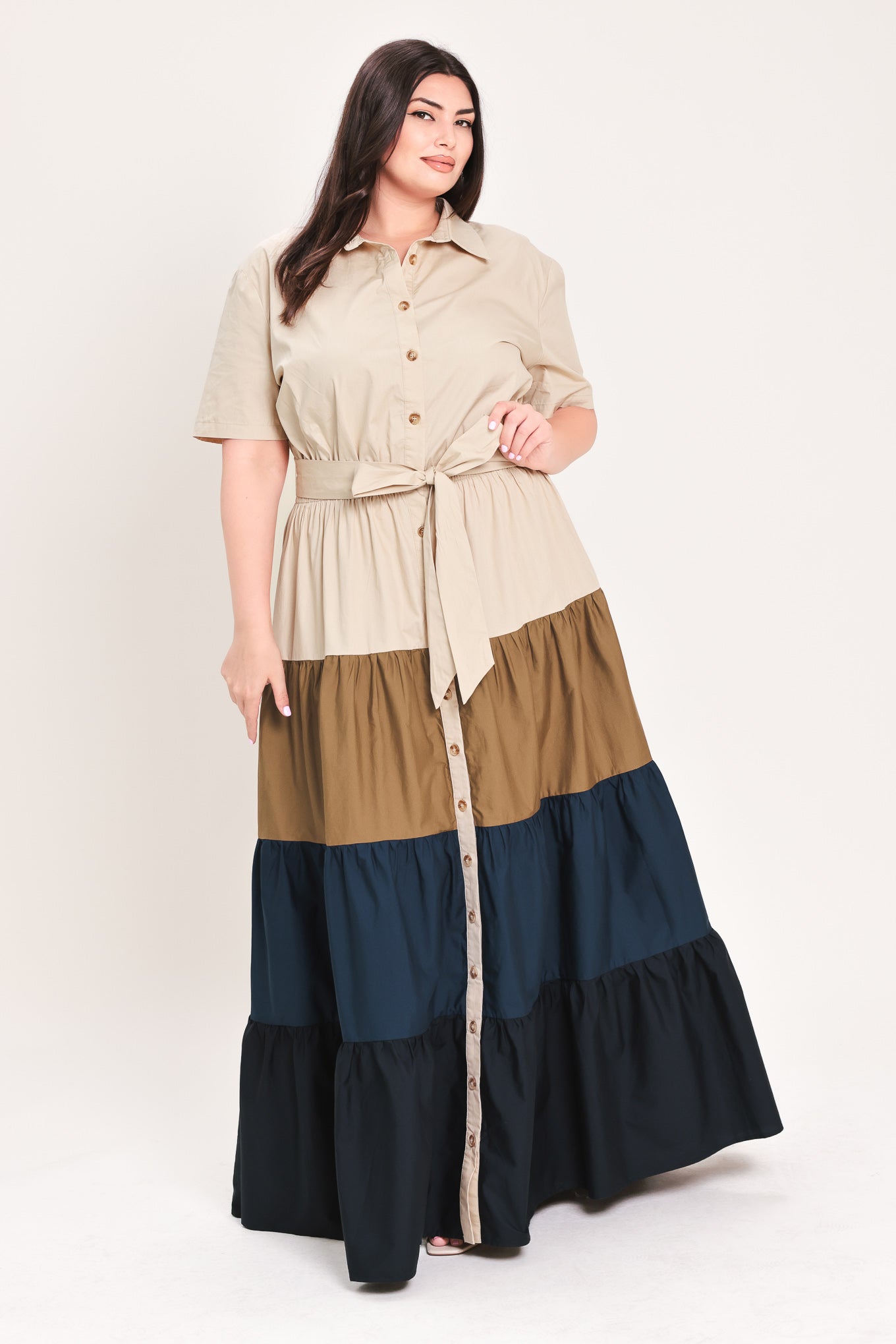 Woman wearing a color-blocked midi dress with beige, brown, and navy | Flying Tomato Curve