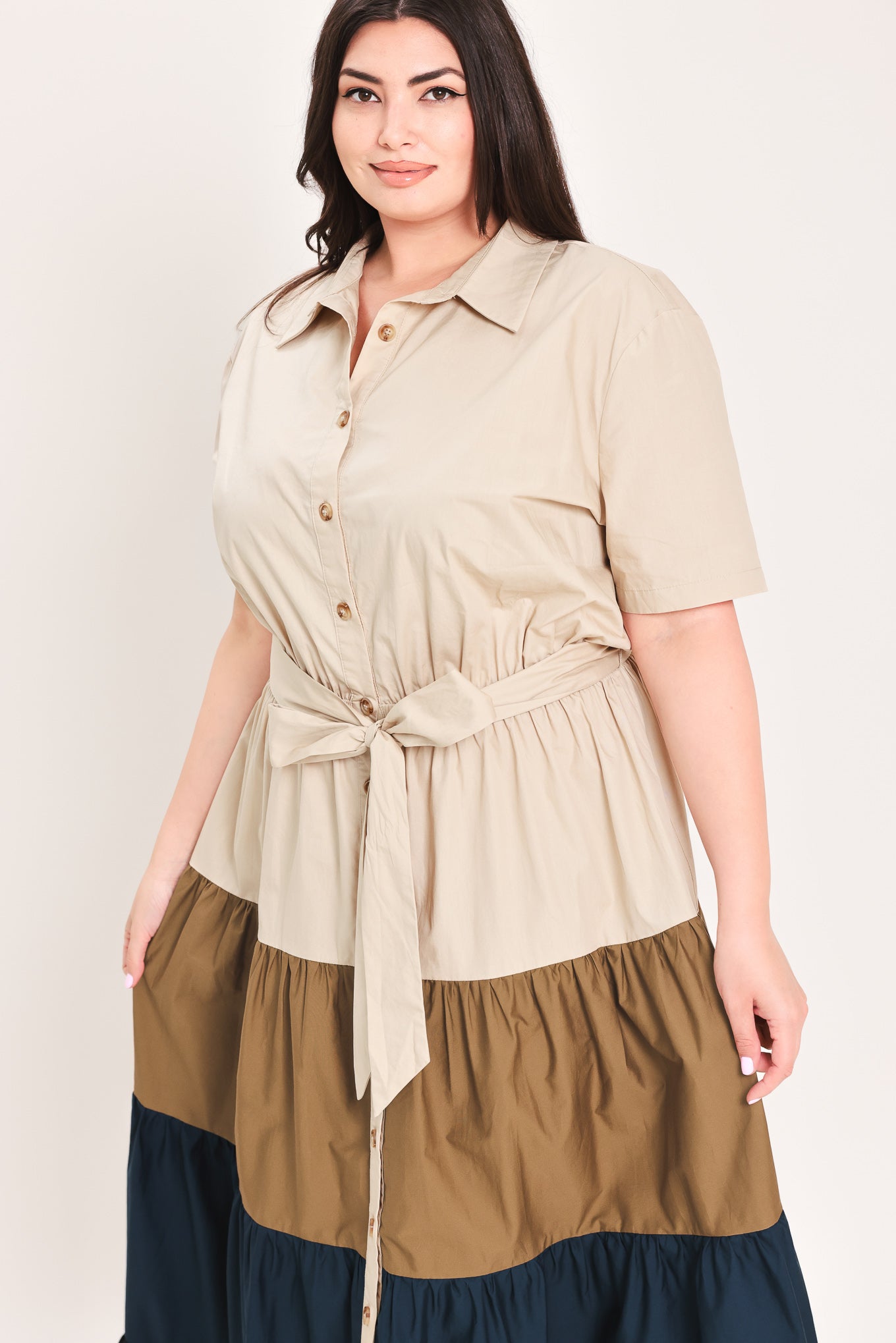 Woman wearing a color-blocked midi dress with beige, brown, and navy | Flying Tomato Curve