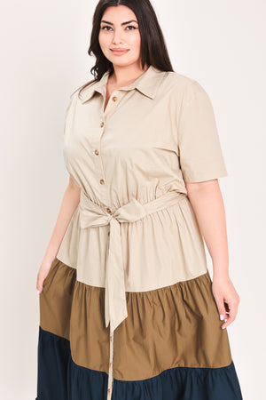 Woman wearing a color-blocked midi dress with beige, brown, and navy | Flying Tomato Curve