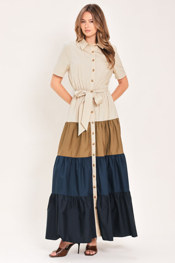Woman wearing a color-blocked midi dress with beige, brown, and navy | Flying Tomato