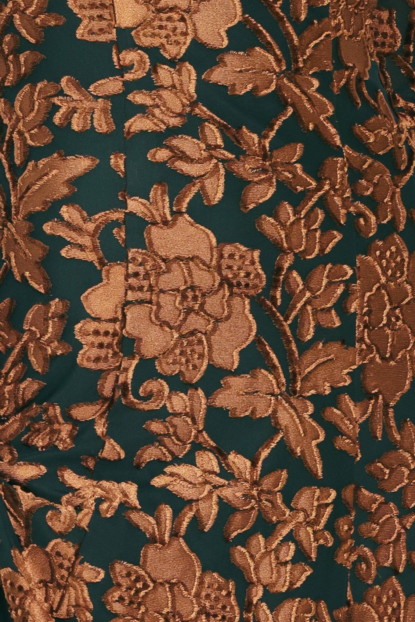 A woman modeling a long-sleeve midi dress with a brown and dark green floral pattern | FLying Tomato