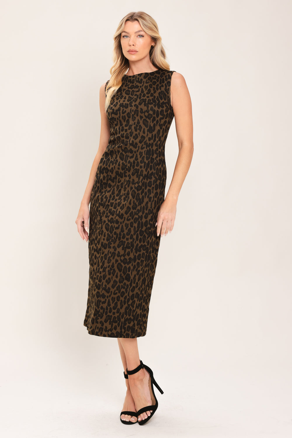 Woman wearing a brown and black leopard print twill midi dress with round neckline, sleeveless, back slit and zipper closure | Flying Tomato