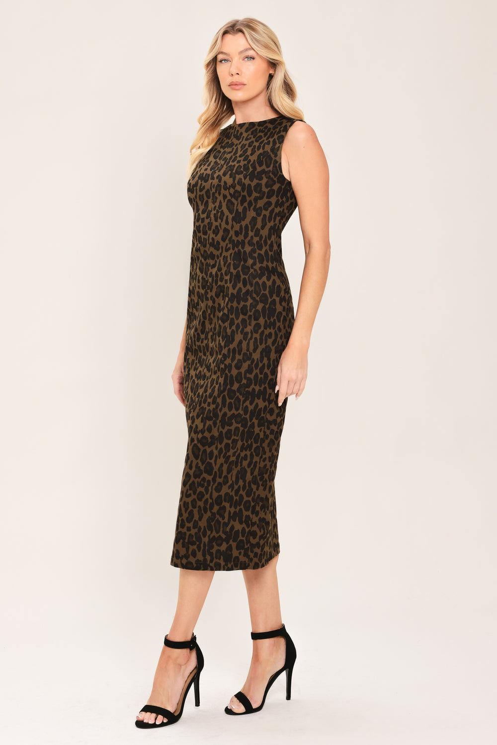 Woman wearing a brown and black leopard print twill midi dress with round neckline, sleeveless, back slit and zipper closure | Flying Tomato