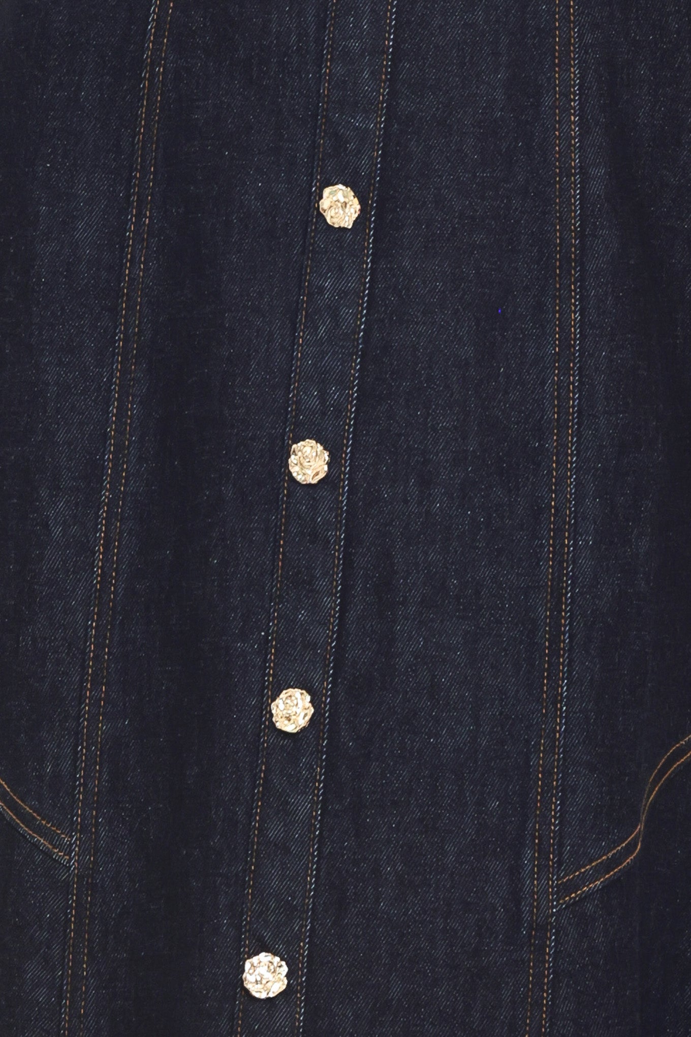 Woman wearing a dark indigo denim sleeveless midi dress with buttons | Flying Tomato