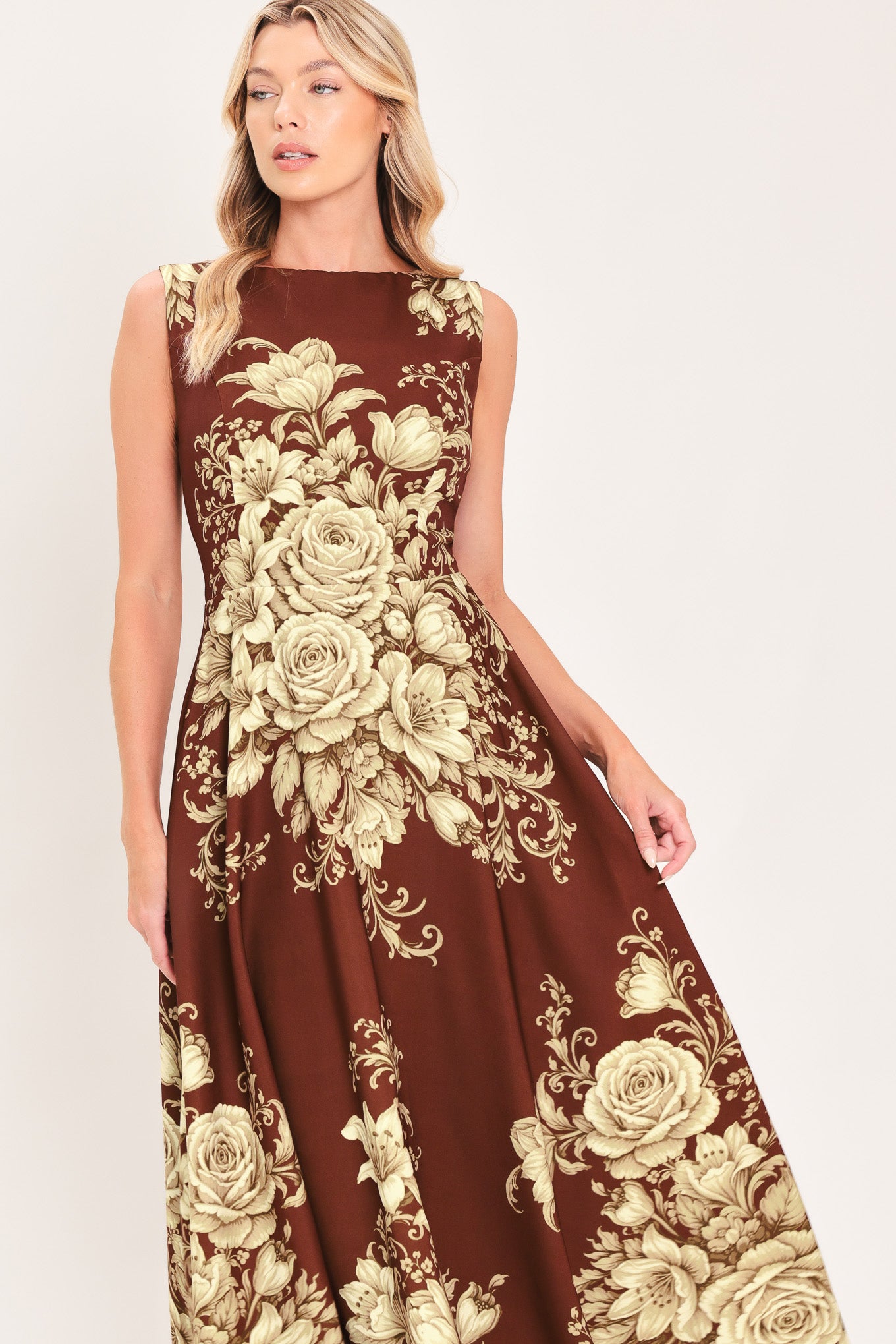A sleeveless A-line midi dress in dark brown/burnt terracotta with a large beige rose and floral baroque pattern | Flying Tomato
