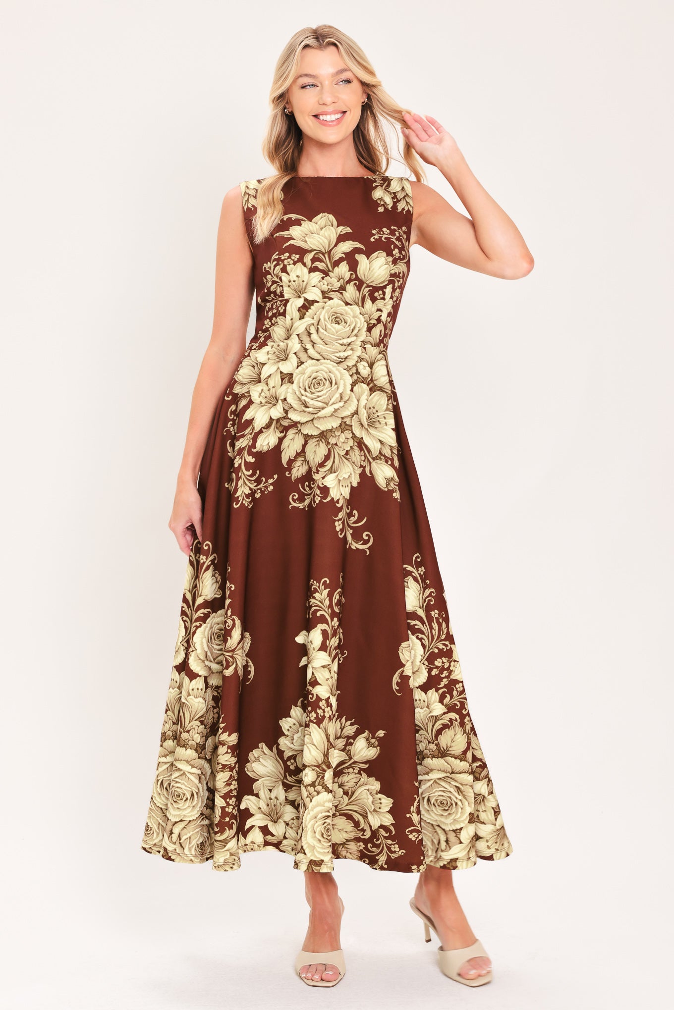 A sleeveless A-line midi dress in dark brown/burnt terracotta with a large beige rose and floral baroque pattern | Flying Tomato