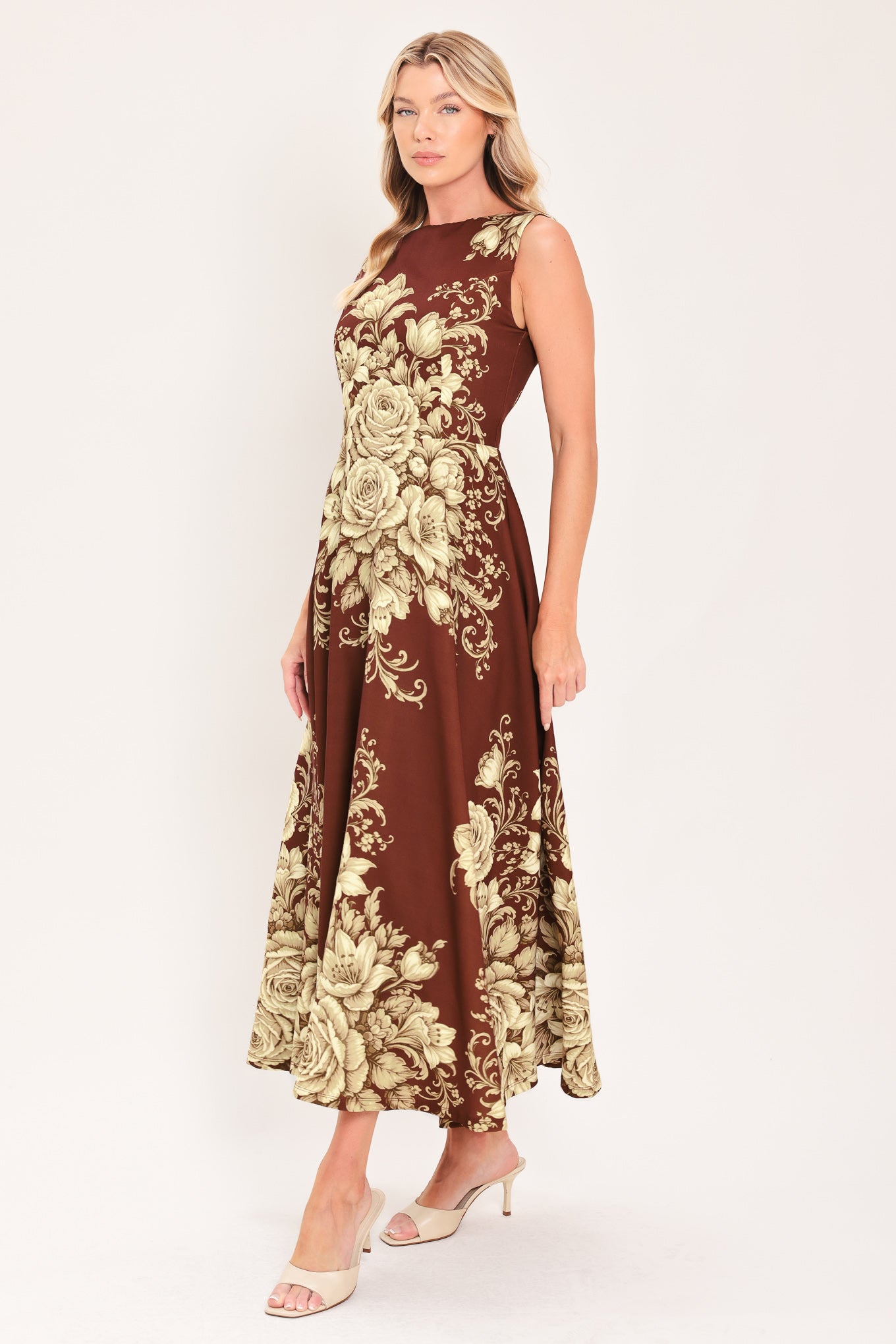 A sleeveless A-line midi dress in dark brown/burnt terracotta with a large beige rose and floral baroque pattern | Flying Tomato