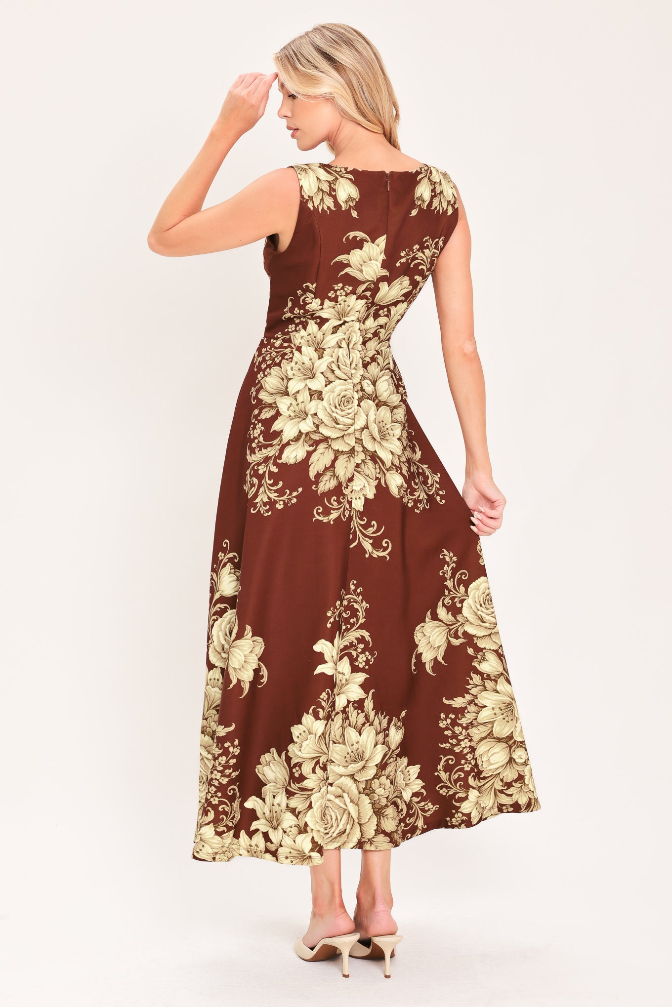 A sleeveless A-line midi dress in dark brown/burnt terracotta with a large beige rose and floral baroque pattern | Flying Tomato