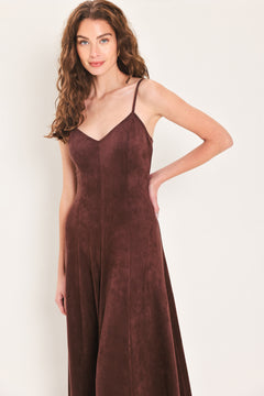 Woman wearing a sleeveless raisin brown suede maxi dress | Flying Tomato