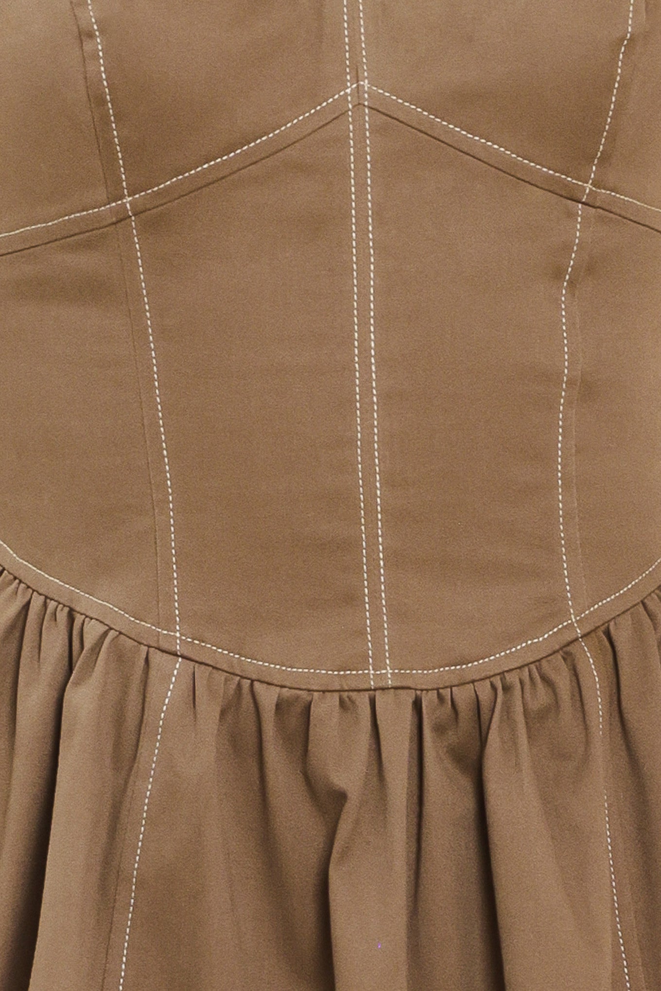 Woman wearing a cool tone brown sleeveless midi dress with bustier stitching details and princess cut waistline | Flying Tomato