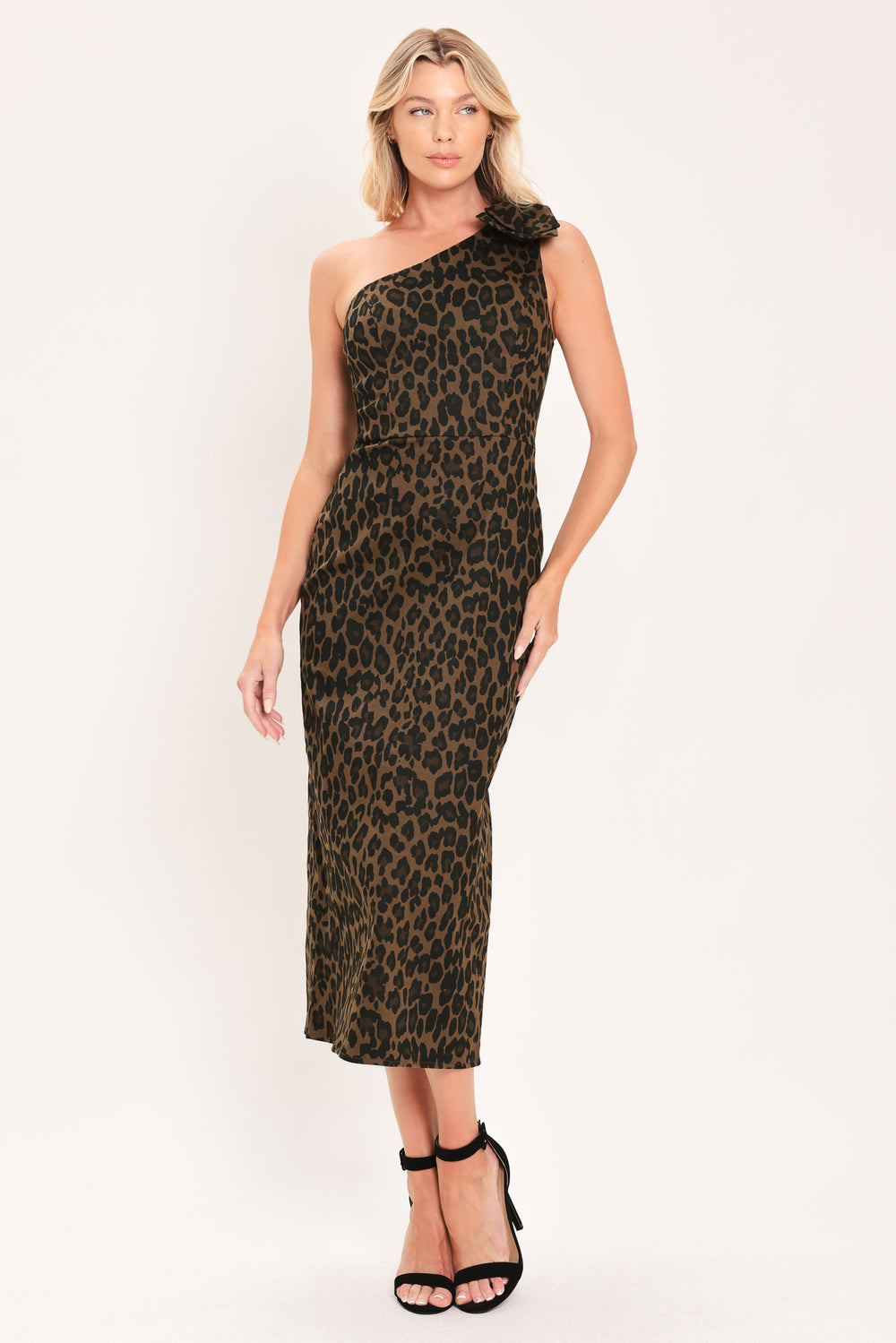 A woman modeling a one-shoulder leopard print midi dress with a oversize bow on the shoulder | Flying Tomato