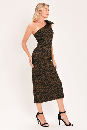 A woman modeling a one-shoulder leopard print midi dress with a oversize bow on the shoulder | Flying Tomato