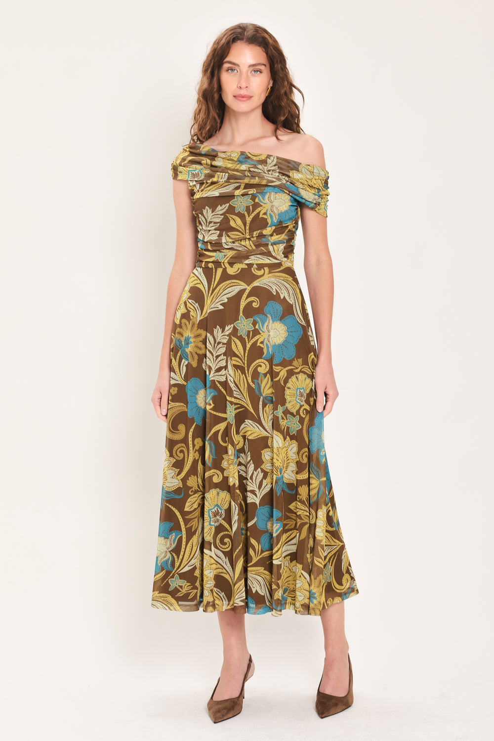 Woman wearing a brown off the shoulder mesh midi dress with teal and gold-tone floral and leaf pattern | Flying Tomato