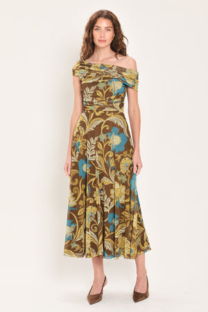 Woman wearing a brown off the shoulder mesh midi dress with teal and gold-tone floral and leaf pattern | Flying Tomato