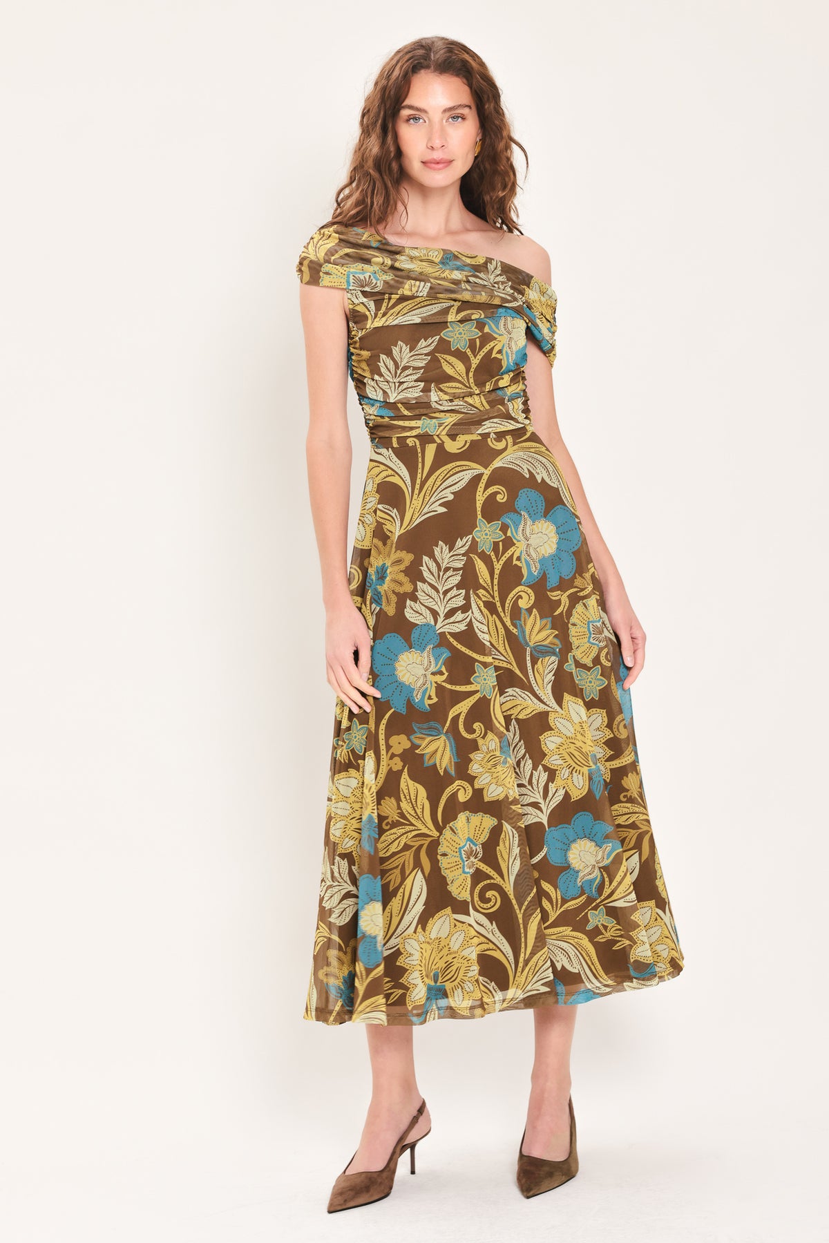 Woman wearing a brown off the shoulder mesh midi dress with teal and gold-tone floral and leaf pattern | Flying Tomato