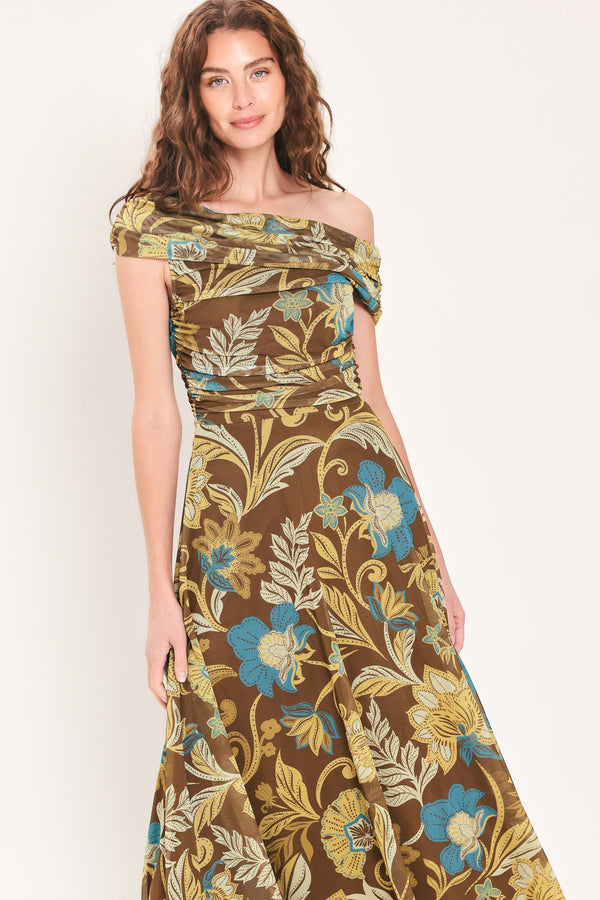 Woman wearing a brown off the shoulder mesh midi dress with teal and gold-tone floral and leaf pattern | Flying Tomato