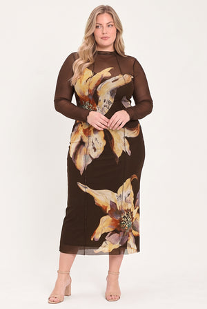 A woman modeling a brown long-sleeve midi dress with sheer mesh sleeves and a large yellow and beige floral print | Flying Tomato