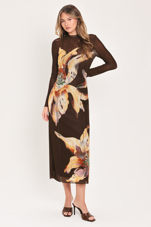 Woman wearing a brown midi mesh dress with a large floral print | Flying Tomato