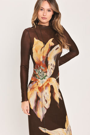 Woman wearing a brown midi mesh dress with a large floral print | Flying Tomato