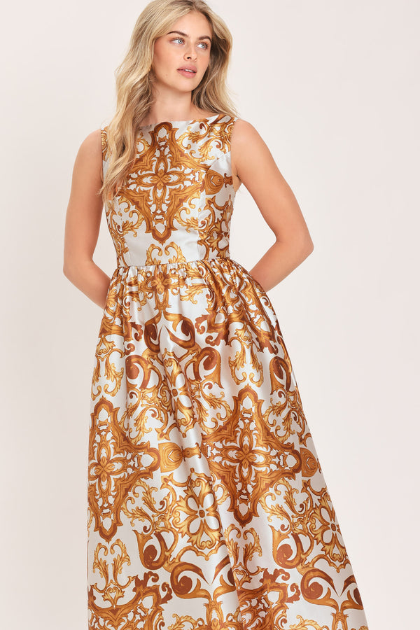 Woman wearing a boat neck sleeveless baroque print maxi dress | Flying Tomato