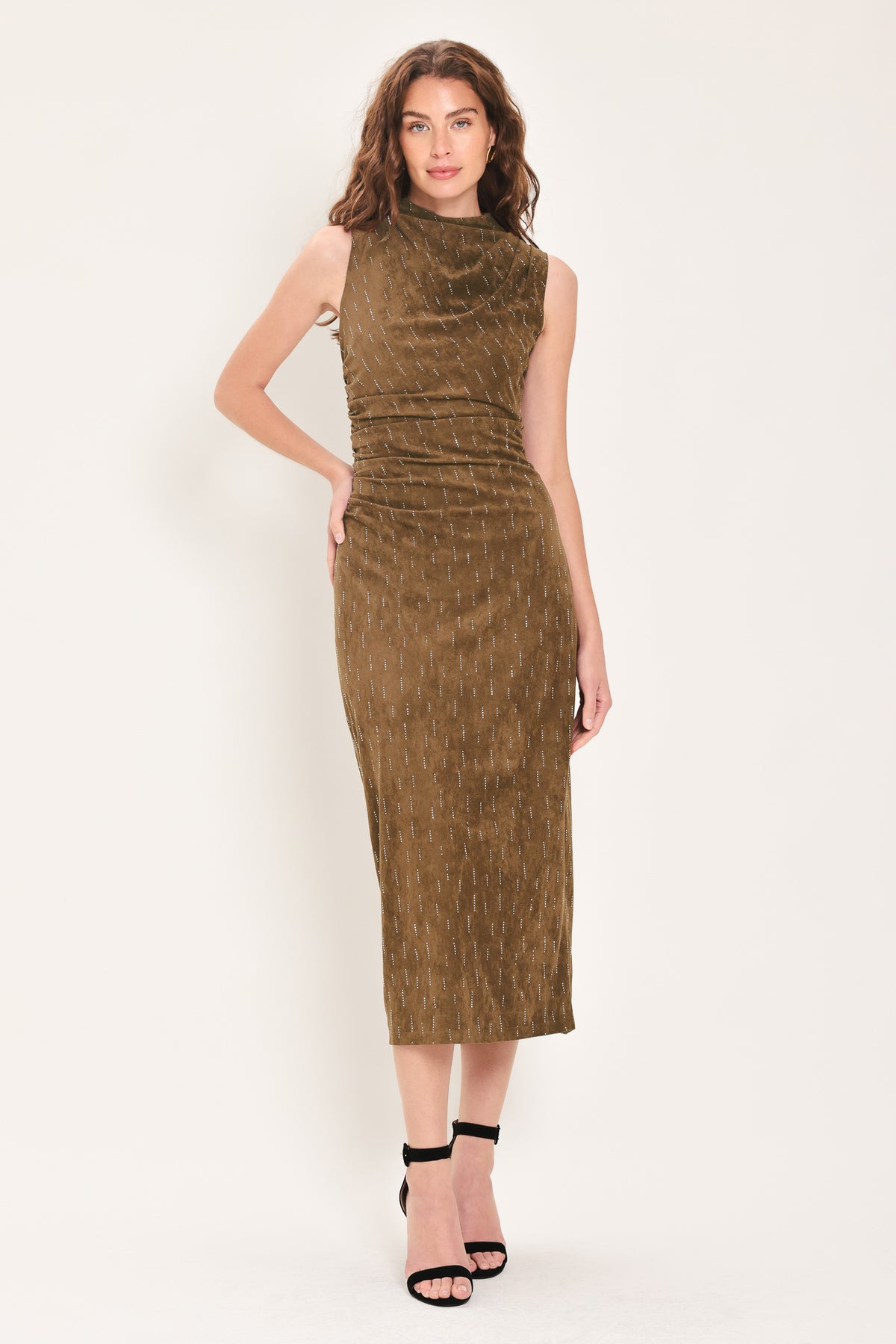 Woman wearing a walnut brown suede sleeveless midi dress with small linear rhinestone embellishments that looks like rain & a ruched waist | Flying Tomato