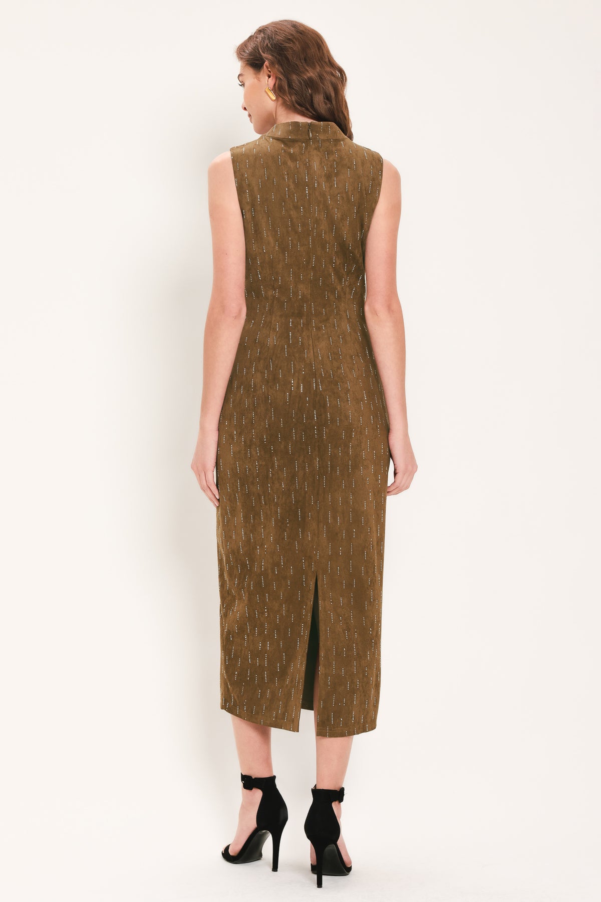 Woman wearing a walnut brown suede sleeveless midi dress with small linear rhinestone embellishments that looks like rain & a ruched waist | Flying Tomato