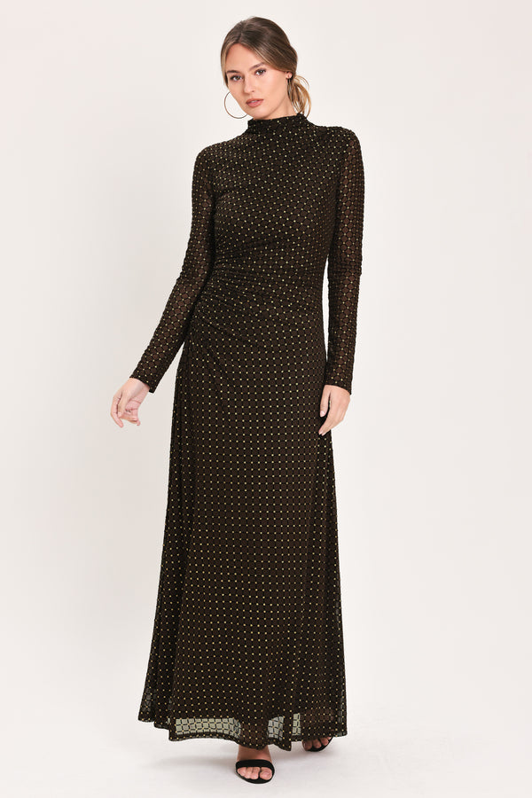 Woman wearing a long sleeve dark brown mesh maxi dress with gold tone rhinestones | Flying Tomato