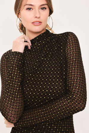 Woman wearing a long sleeve dark brown mesh maxi dress with gold tone rhinestones | Flying Tomato