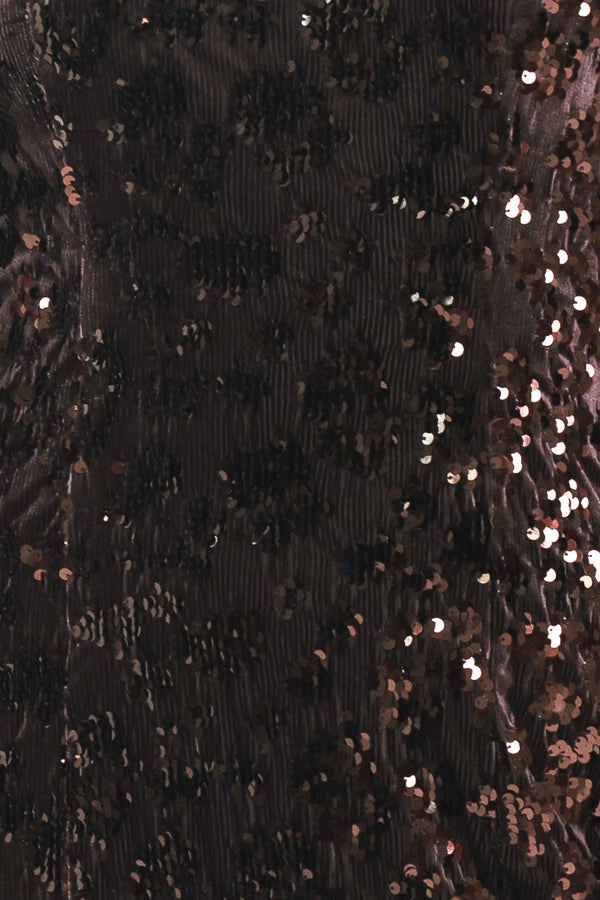 A woman modeling a sleeveless dark brown midi dress covered in shimmering sequins | Flying Tomato