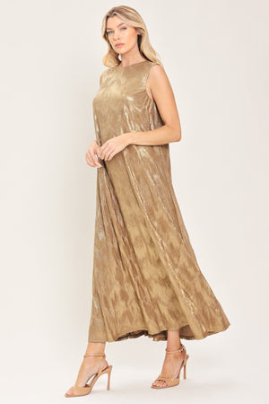 Woman wearing a sleeveless gold metallic like midi dress with dark brown suede waist belt | Flying Tomato