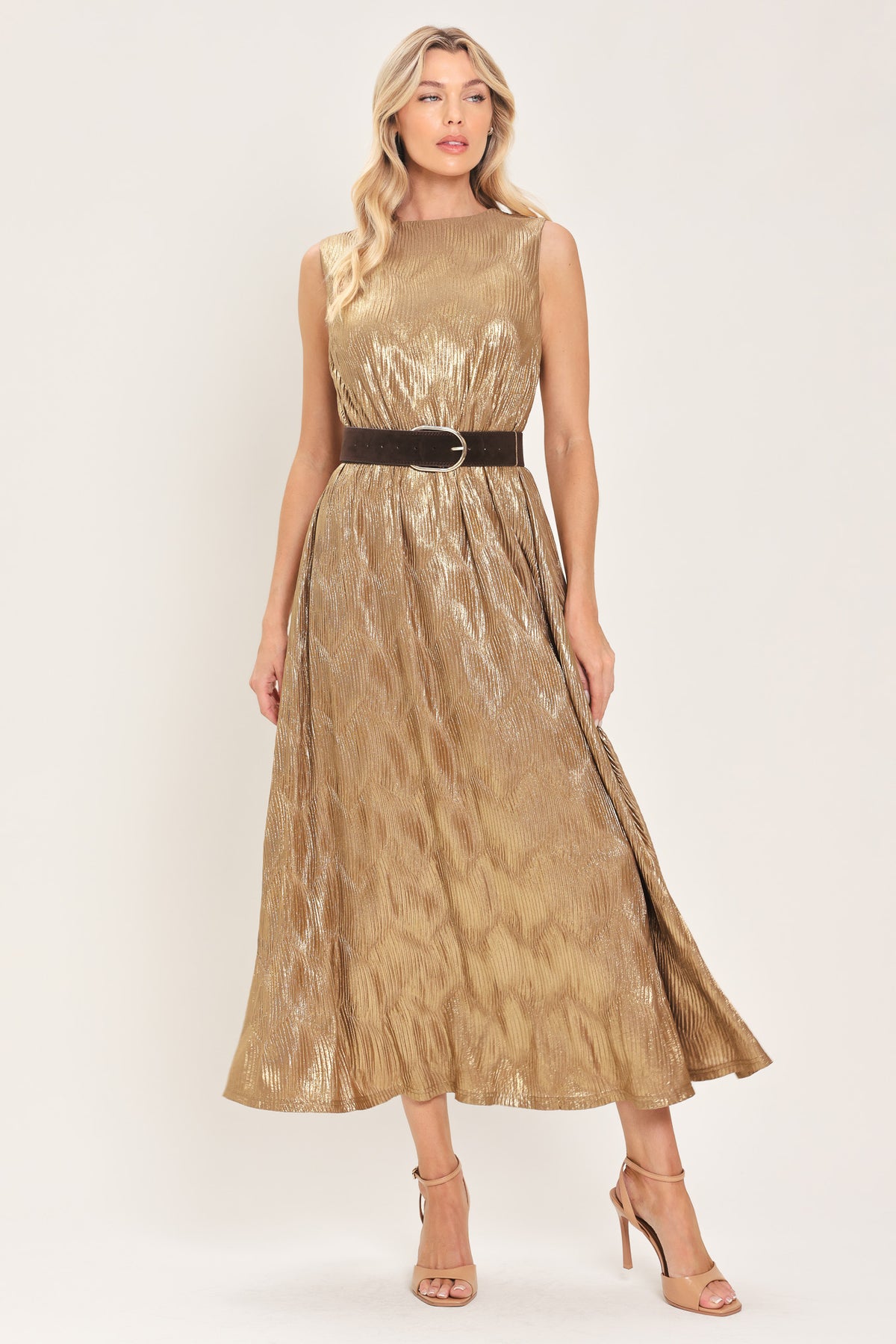Woman wearing a sleeveless gold metallic like midi dress with dark brown suede waist belt | Flying Tomato