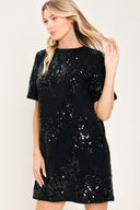 A woman modeling a short-sleeve black sequined mini dress | Flying Tomato